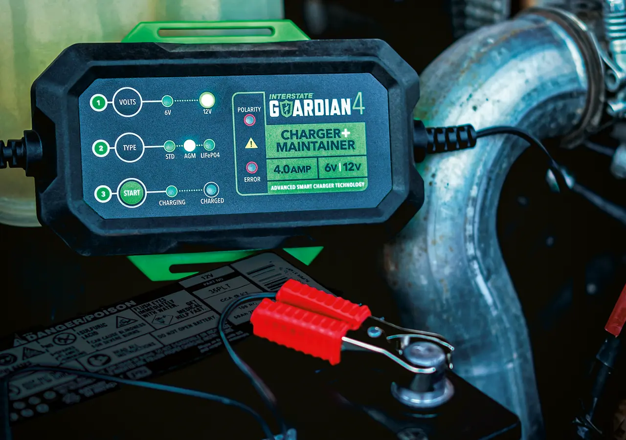 battery connected to jumper cables