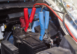 battery with jumper cables connected