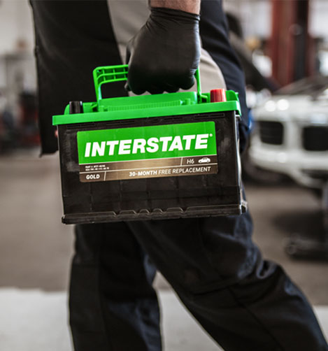 dealer walking with battery