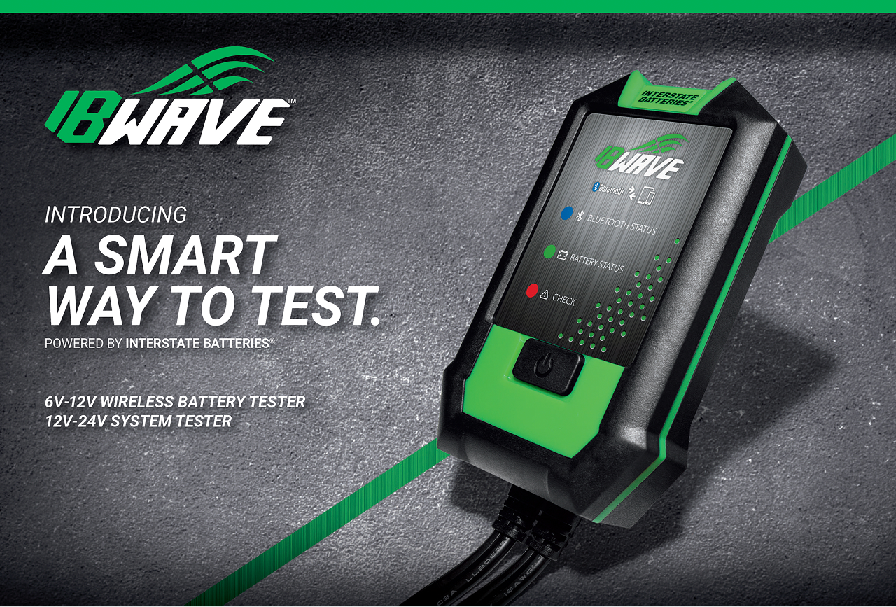 Promotional image of the IB Wave wireless battery tester by Interstate Batteries, showing a black-and-green handheld device with LED indicators and text reading “A smart way to test.”