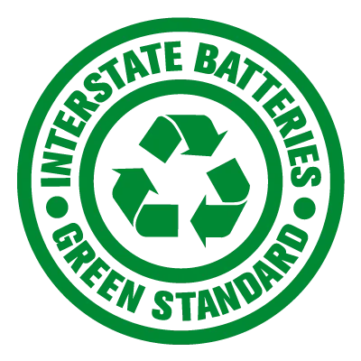 Circular green and white stamp logo reading 'Interstate Batteries Green Standard' wrapped around a green universal recycling symbol in the center