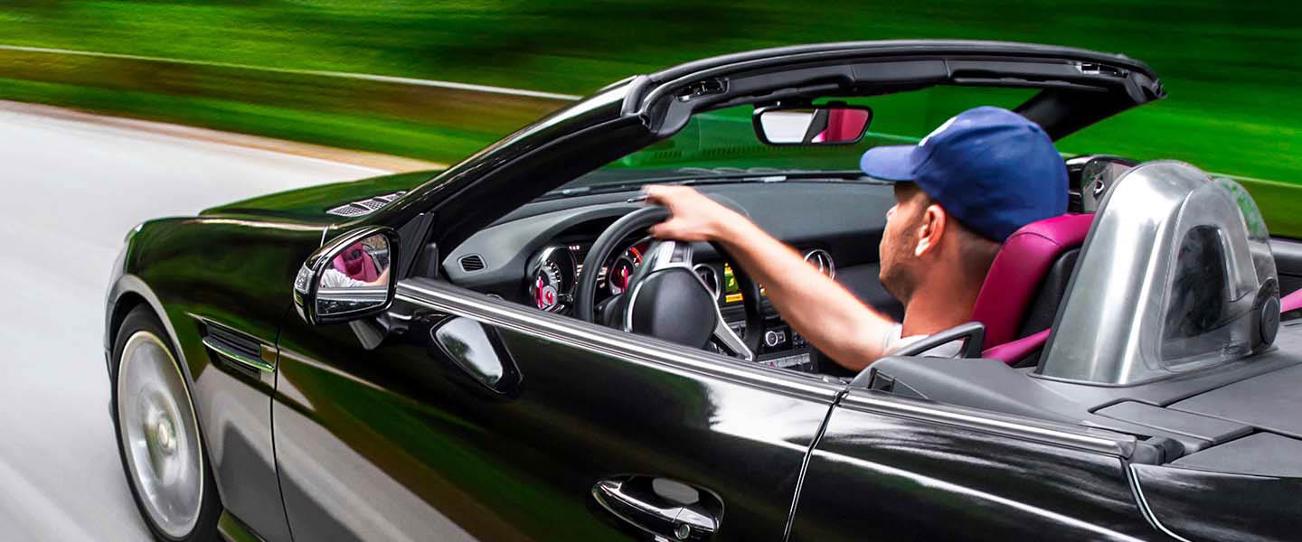 Convertible driving down the highway