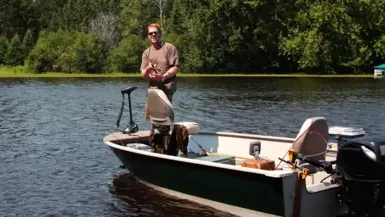 Image of boat in water with Interstate Marine Dual Purpose Battery