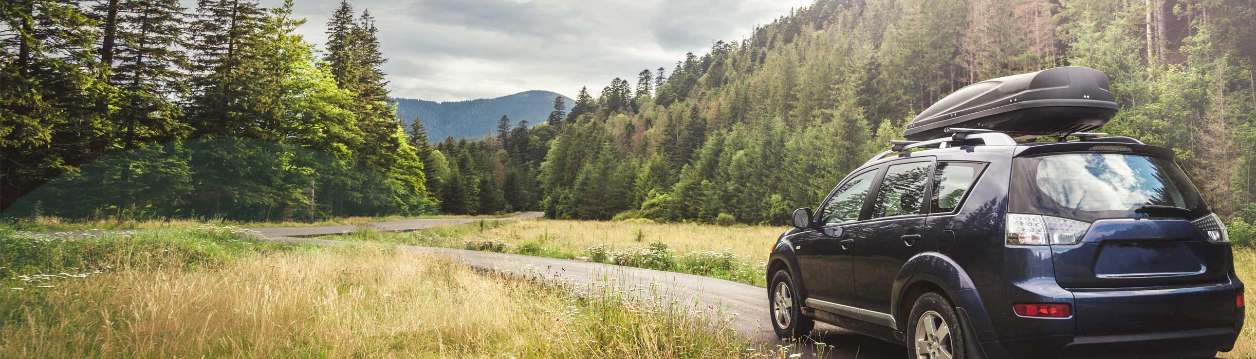 car traveling in the mountains
