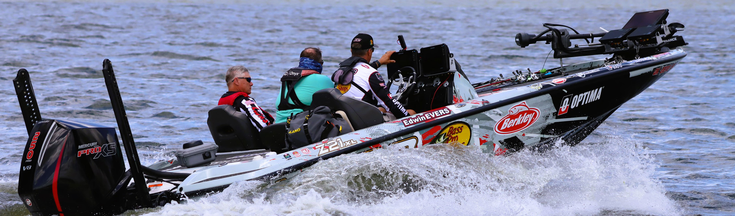 3 people on a marine boat in the water