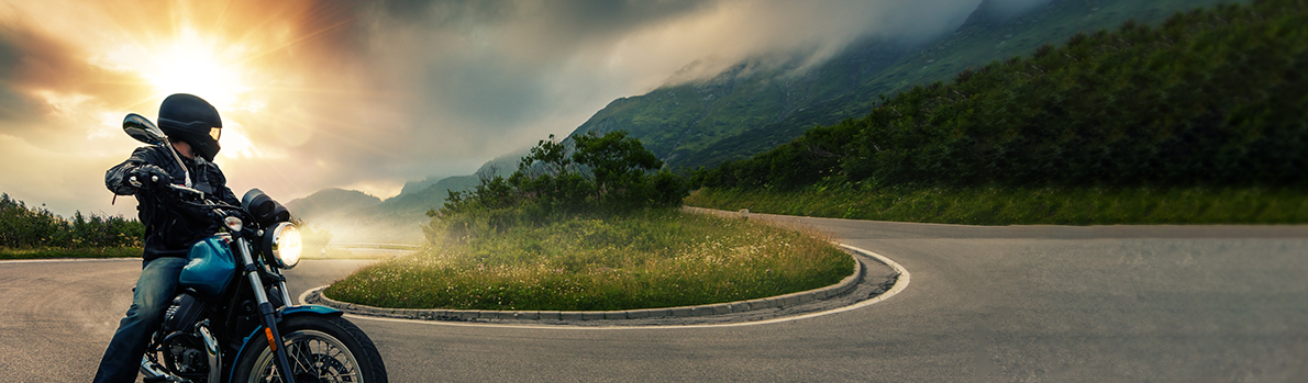 Image of Motorcyler Rider on curved road