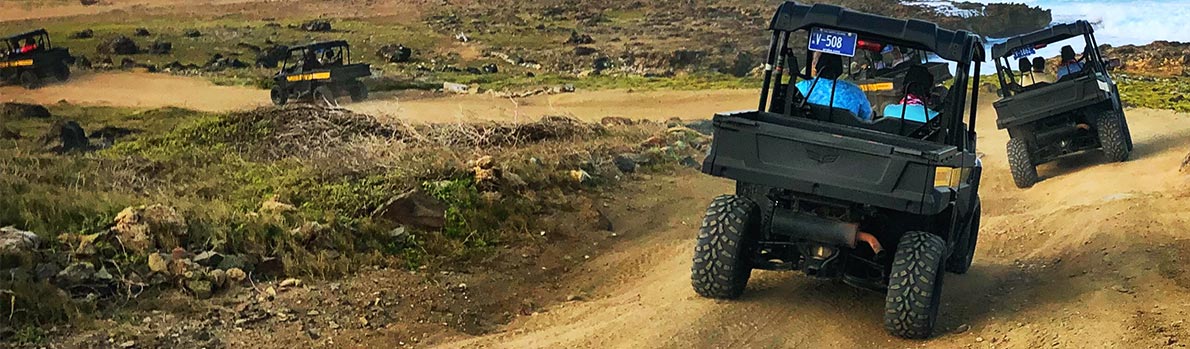 Image of UTVs on off-road track