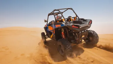 Image of UTVs on off-road track