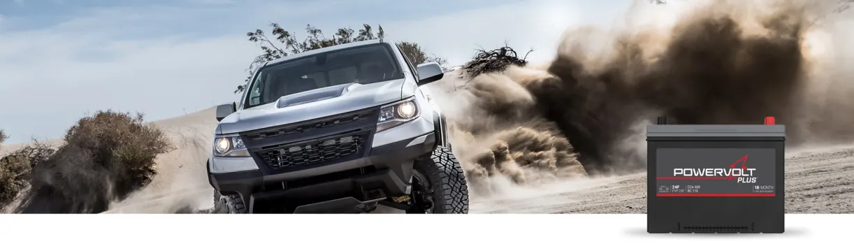 truck turning in a sand dune with PowerVolt Battery in bottom right corner