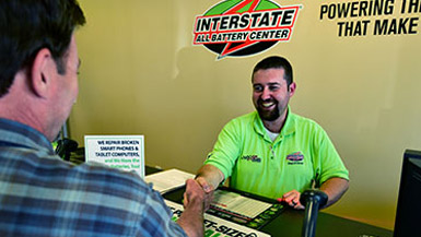 Interstate Battery Customer Shaking Hands with Battery Specialist
