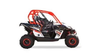 Side-by-side UTV off-road vehicle with orange roll cage and rugged tires